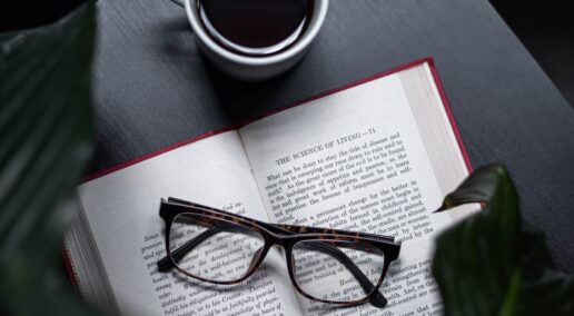 side gig, a picture of a book, coffee and a pair of glasses