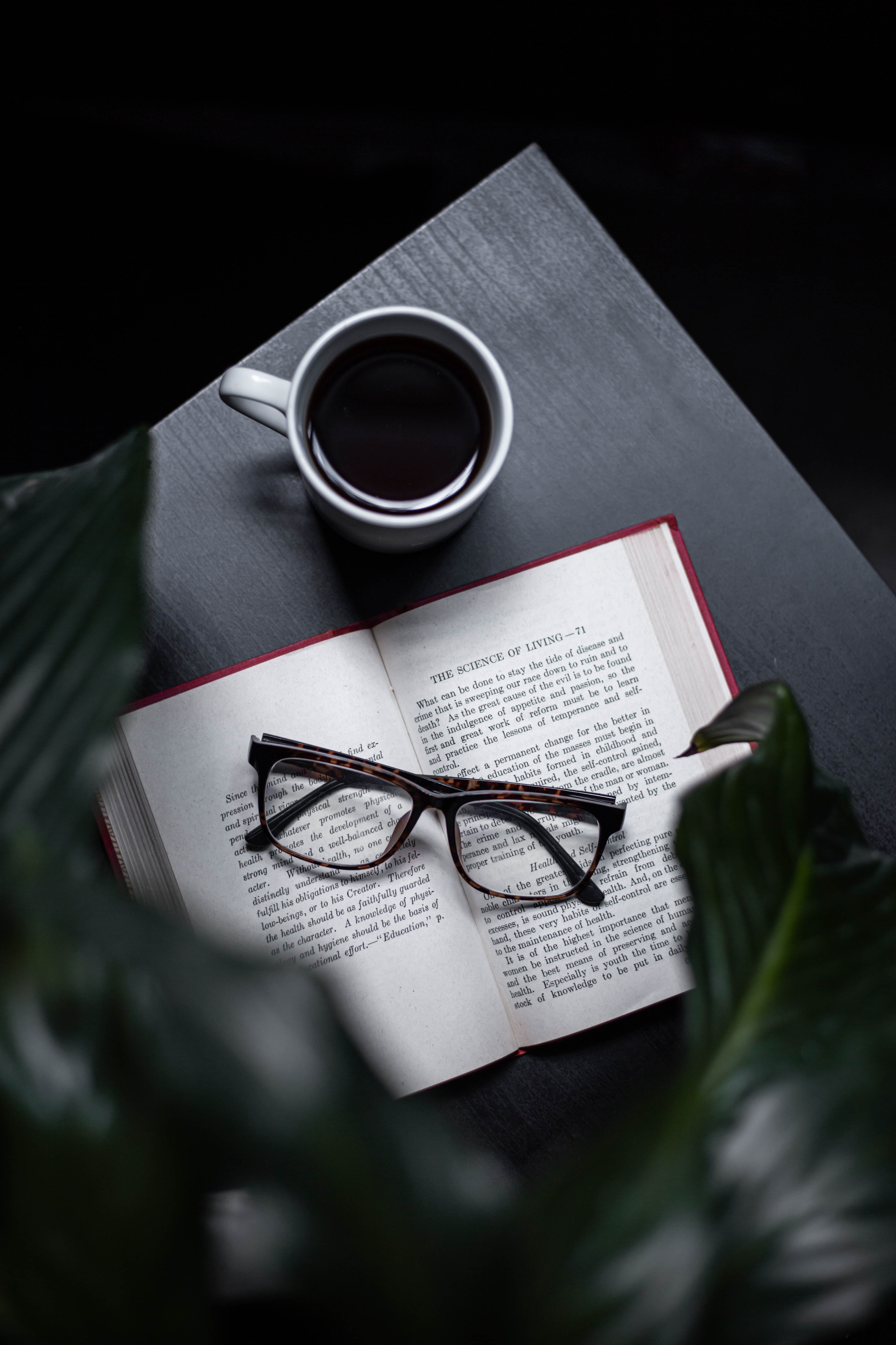 side gig, a picture of a book, coffee and a pair of glasses